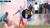 Troyes fans throw flares onto pitch in protest of Man City owners as Ligue 2 game is abandoned