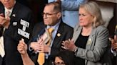 US Lawmaker Hold Ups "War Criminal" Sign During Netanyahu's Congress Speech