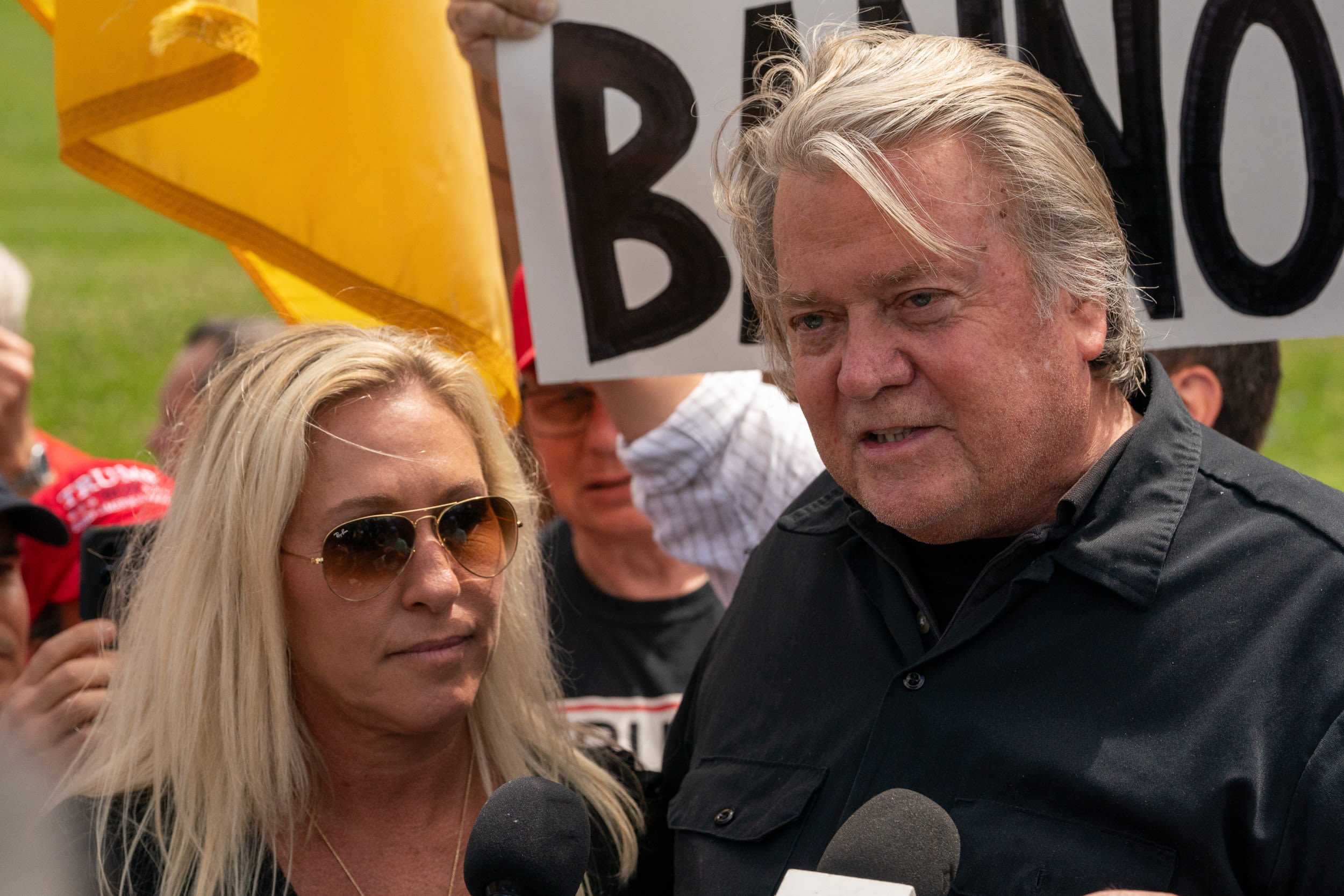 Steve Bannon and Marjorie Taylor Greene Interrupted By Protesters