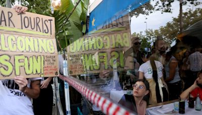 ‘Tourists go home’: Why Barcelona residents sprayed water on visitors