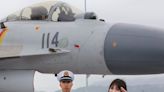 China is scrambling to find pilots to fly from its growing aircraft carrier fleet