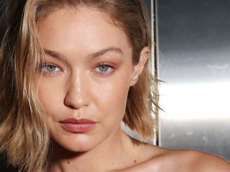 Gigi Hadid rocks a mini dress made *entirely* of packing tape