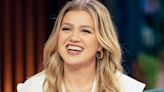 Kelly Clarkson commands attention in leather mini skirt and the ultimate knee-high boots