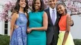 Former US president Barack Obama and family, seen here with their dogs, at the White House in 2015