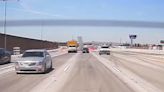 Small plane catches fire after crash-landing on California freeway