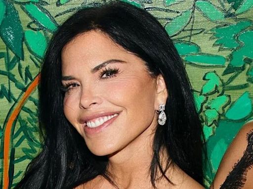 Lauren Sanchez, 54, turns up the heat in fire-red minidress made of a very unusual fabric