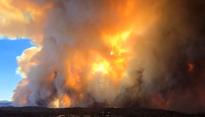 Entire New Mexico village evacuates as a pair of fires converges on it ‘like a pair of tongs,’ official says