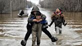 Russia floods: Thousands evacuated after burst dam worsens record water levels and threatens city