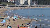 UK heatwave sparks yellow health warnings as temperatures soar to a sizzling 30C