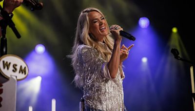 Carrie Underwood shows off her legs in Daisy Dukes at fan club event