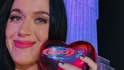 Katy Perry showcases her pert derriere in tiny bikini