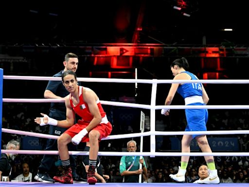 Algeria boxer in Olympic gender row wins in 46 seconds as Italian PM hits out