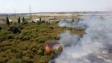 Dartford fire rages on close to flats and houses in dramatic drone footage