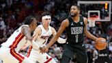 Nets remontan en 2da mitad y se imponen 109-105 a Heat