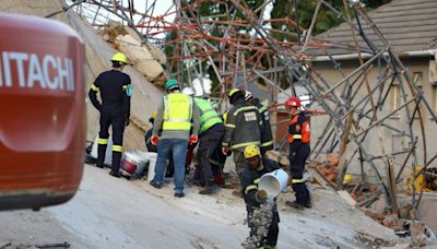 At least five killed, dozens trapped in building collapse in South Africa