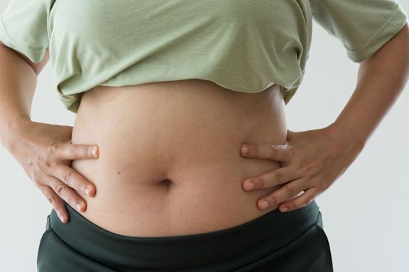 Lose stubborn belly fat that 'hangs' with two simple steps – there's one catch