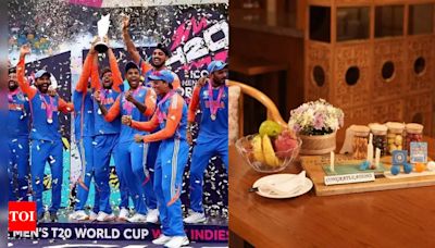 Watch pics: Team India, T20 WC champions welcomed with personalised pics, chocolate bats - Times of India