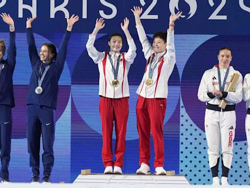 One down, seven to go: China wins first diving gold as it pursues unprecedented sweep of all eight - The Economic Times