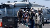 Navy rescues merchant crew in the Red Sea, bombs Houthi sites as attacks continue