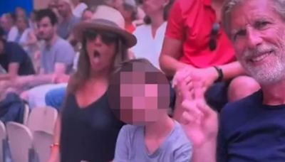 Tennis fan flashes boobs on live TV while sat next to child at Olympics 2024