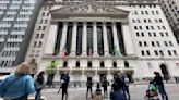 Stock market today: Wall Street points toward losses as markets digest earnings, dealmaking