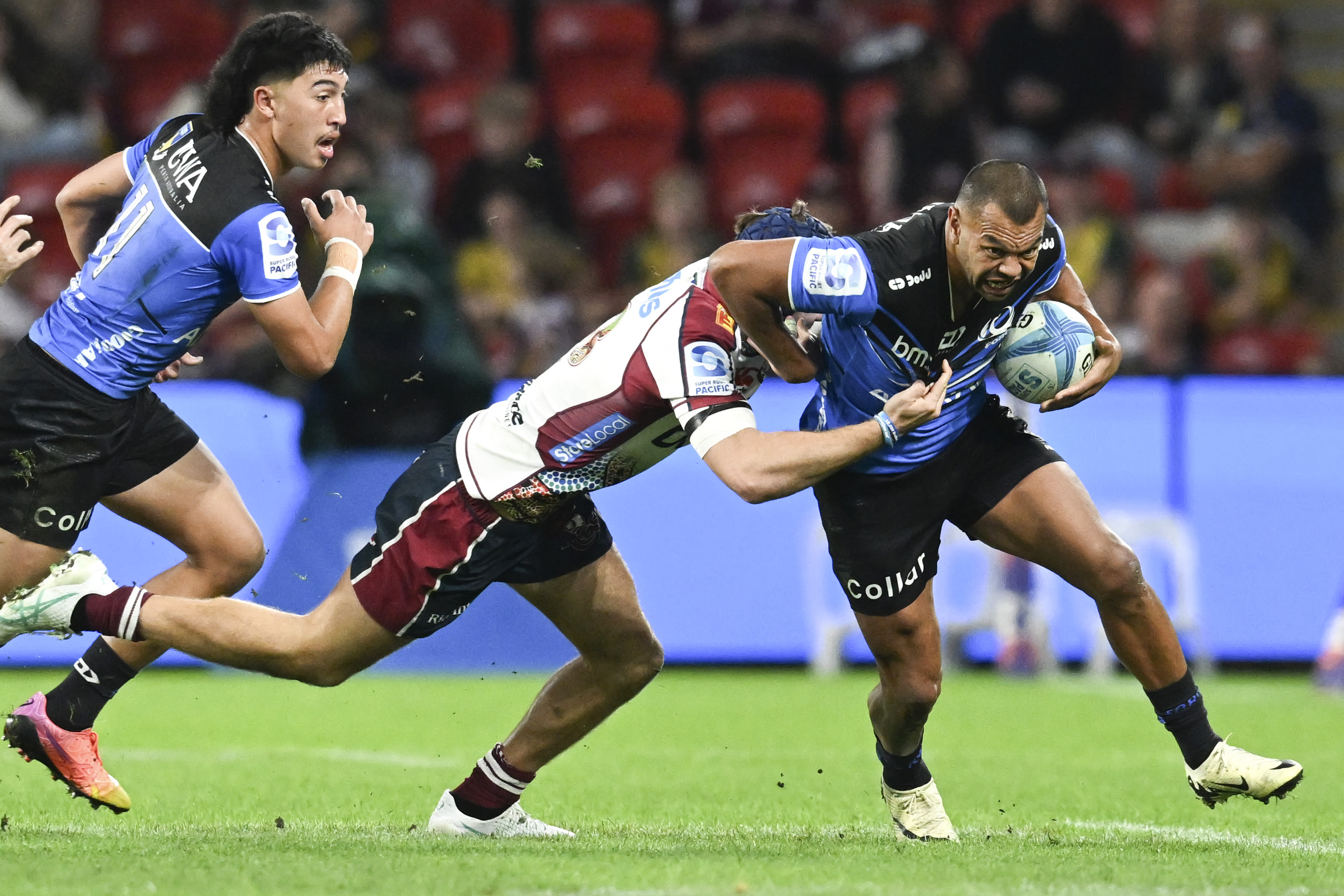 Crusaders beat Blues to keep playoff hopes alive in Super Rugby. Reds, Moana Pasifika also win