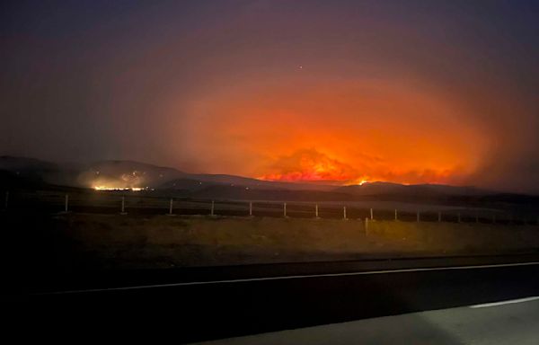 Wildfires threaten communities in the West as Oregon fire closes interstate, creates its own weather