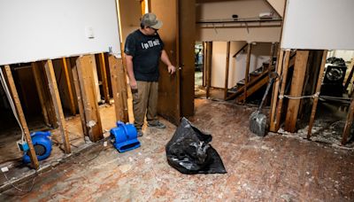 Residents in Alaska capital clean up swamped homes after an ice dam burst and unleashed a flood