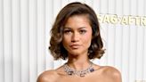 Zendaya Channels Famous Disney Character in Dazzling Gold & Purple Outfit