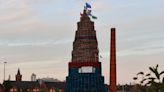 Politicians’ election posters appear on loyalist bonfires