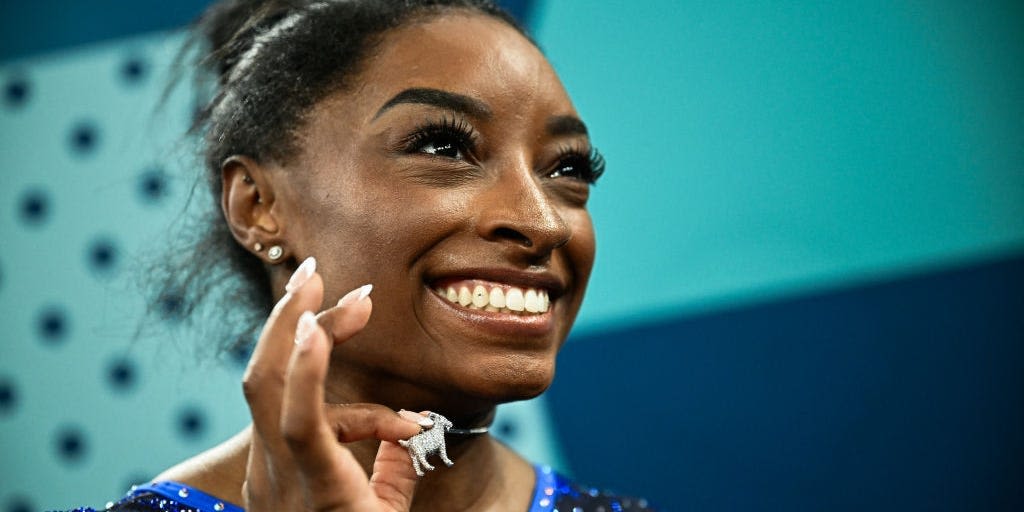 Simone Biles wore a goat necklace encrusted with 546 diamonds while accepting her gold medal at the Paris Olympics