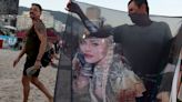 Thousands of Madonna fans gather on Copacabana beach for free concert