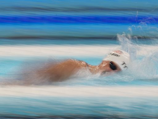Olympic swimming: Ledecky is fastest in heats of 1500; Marchand advances in 2 more races