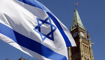 Decision to fly Israeli flag, cancel ceremony at city hall gets pushback from both sides