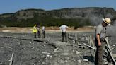 Surprise blast of rock, water and steam sends dozens running for safety in Yellowstone