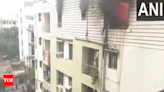 Fire breaks out in apartment at Boring Road in Patna | India News - Times of India