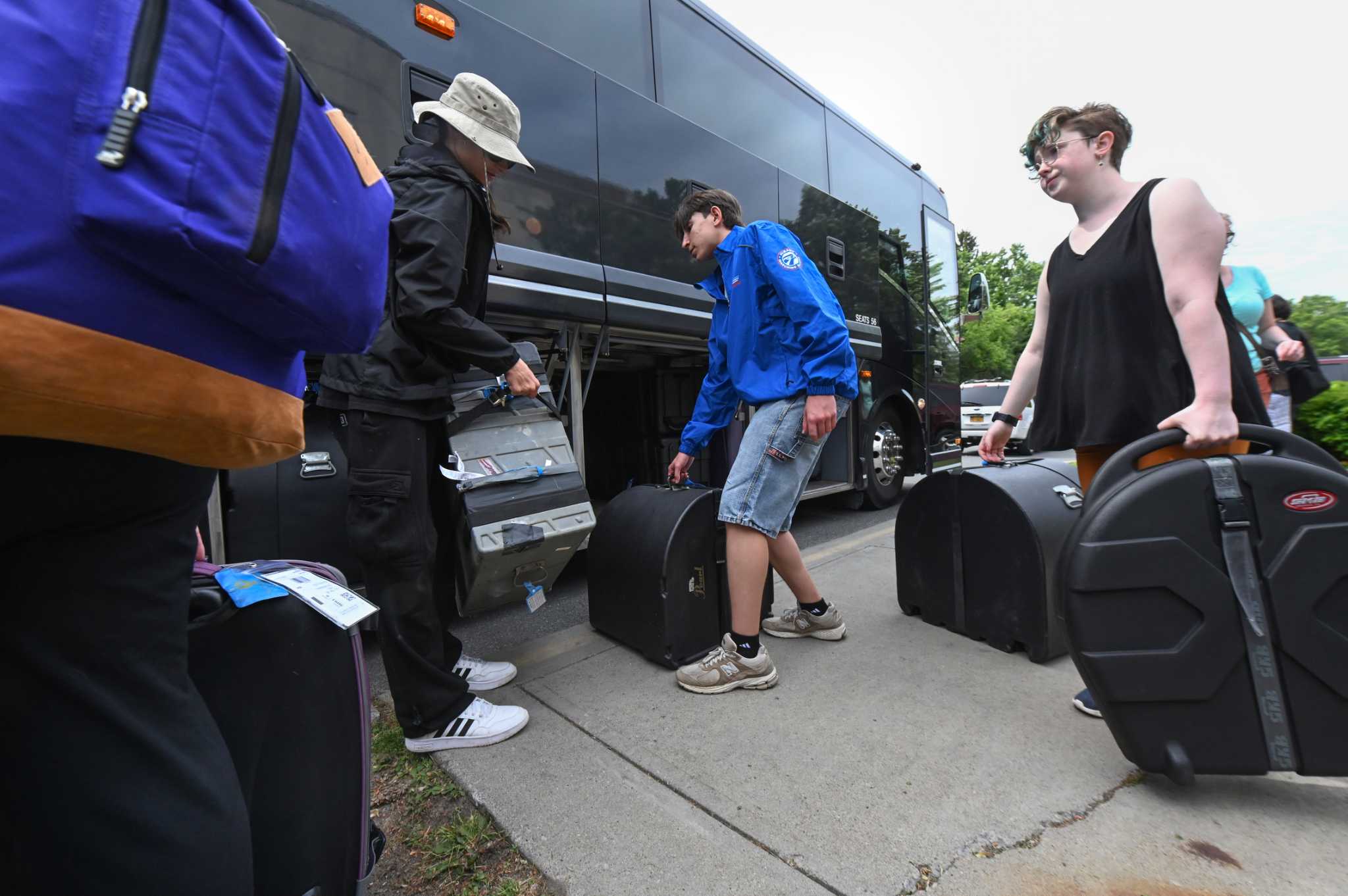 Albany marching band flies to France for historic D-Day ceremonies