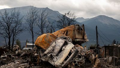 Canadian firefighter dies battling blaze in Alberta