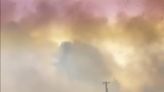 Video shows escape through flames and smoke as wildfire begins burning the outskirts of Idaho town