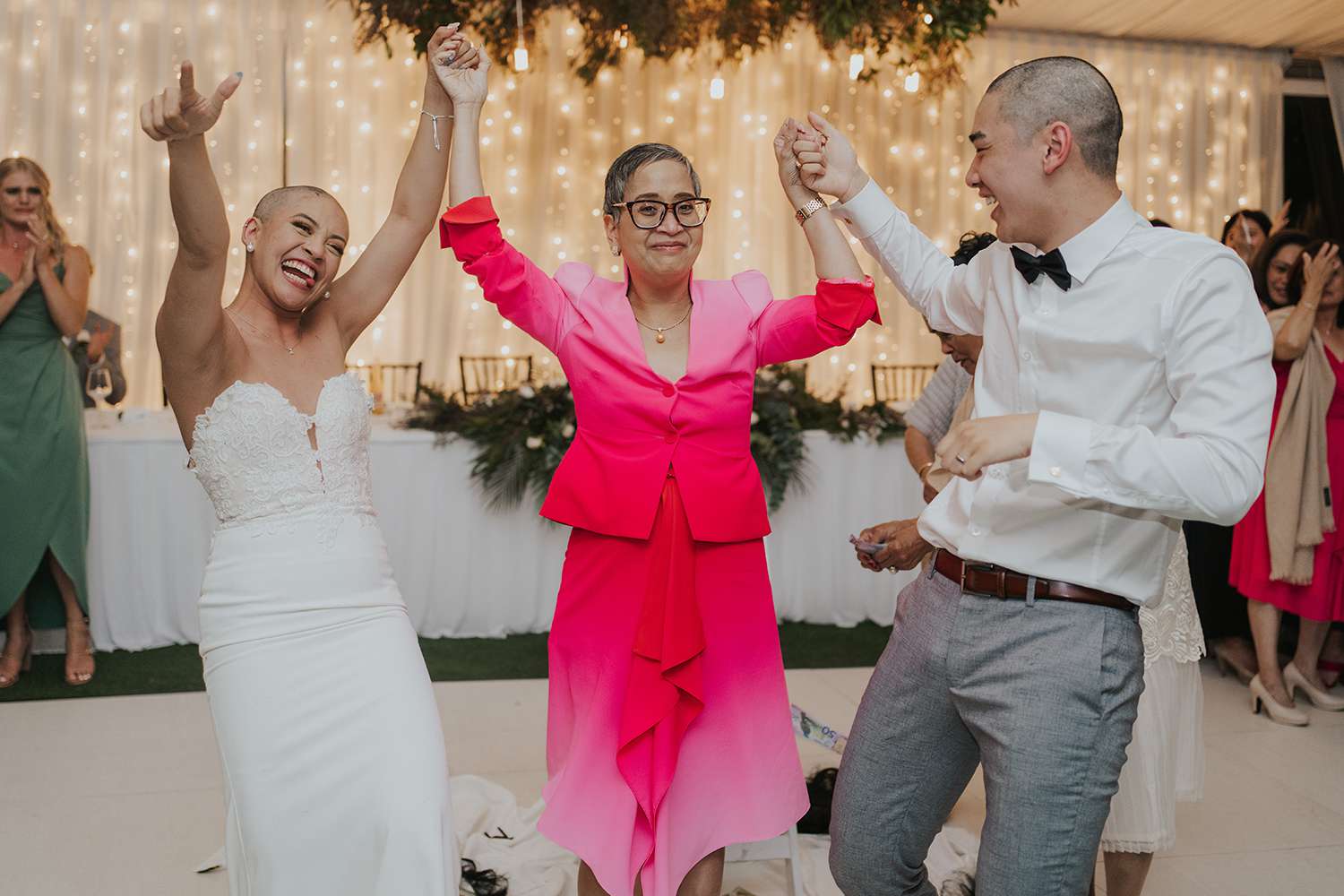 Bride and Groom Shock Wedding Guests by Shaving Their Heads on Dance Floor to Honor Bride’s Mom with Cancer