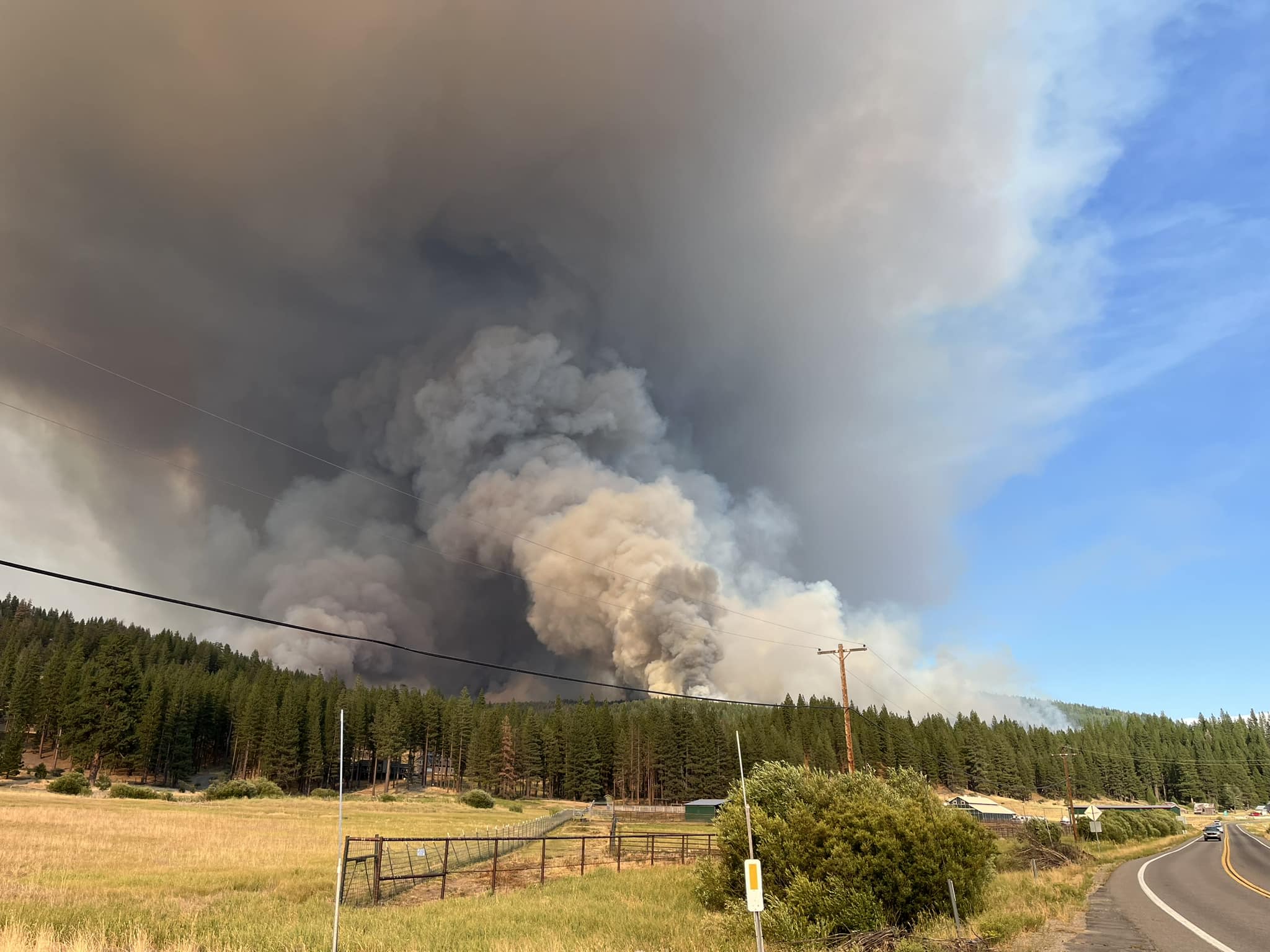 Four wildfires started by lightning threaten towns in California's Sierra