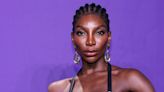 Michaela Coel means business in a leather bra top, midi skirt and gloves