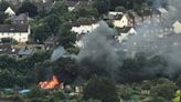 Dramatic video shows smoke billowing into sky from city blaze