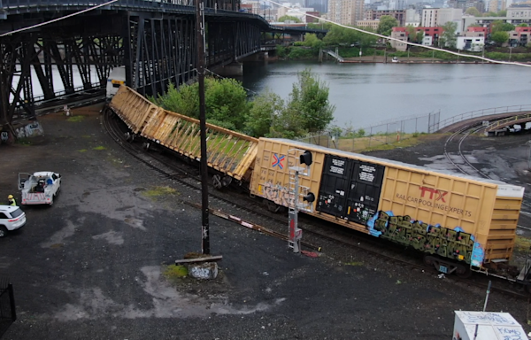 Drone footage reveals extent of Steel Bridge train derailment