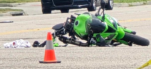 Woman in hospital after motorcycle-vehicle crash in Newport News