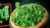 Pizza Hut is debuting a new pizza with a monstrous heap of cilantro on top of it