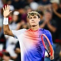 Italy's Flavio Cobolli celebrates a 6-3, 6-2 victory over Felix Auger-Aliassime of Canada at the ATP Montreal Masters