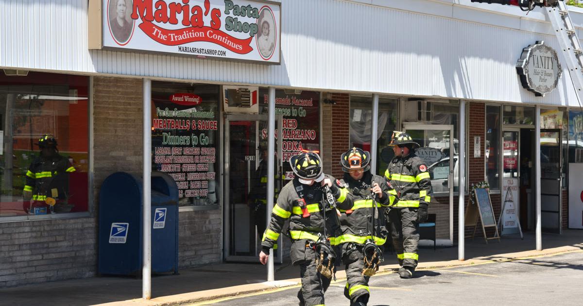 Structure fire temporarily halts operations at South Utica's Ridgewood Market & Deli plaza