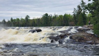 Two people canoeing are missing after going over Minnesota waterfall