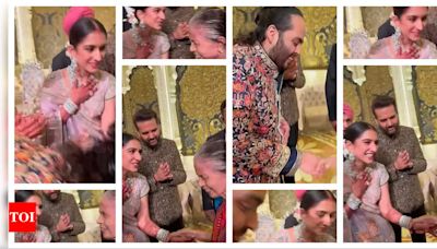 Ambani family's heartwarming gesture captures hearts as the newlyweds Radhika and Anant lovingly touch the feet of Cafe Mysore owner - Times of India